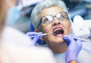 Lady getting a dental exam