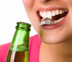 "Top causes of tooth breakage, using teeth as a tool, biting bottle cap"
